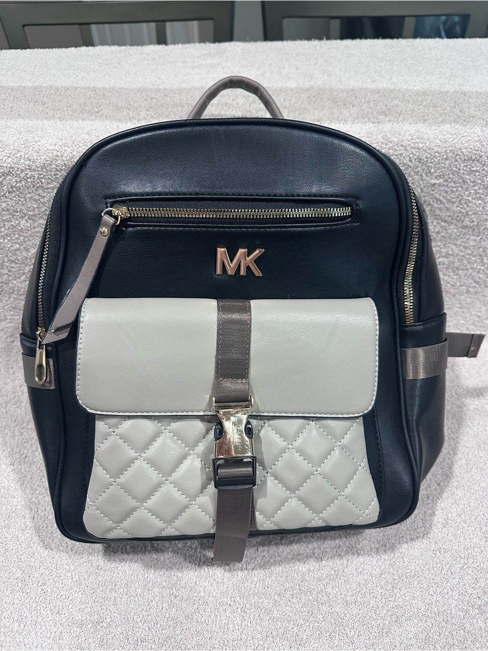 MK Black and gray Quilted Front Backpack